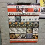 The Beatles on Compact Disc Transferred Direct From The Original Masters wall hanger, with 20 discs;