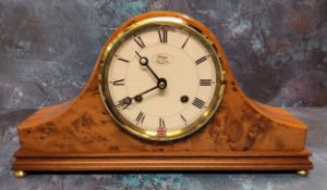 A Britains Clock Co. Napolean Hat mantel clock, walnut finish, cream dial, black Roman numerals,