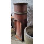 A large salt glazed chimney pot
