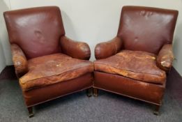 A pair of early 20th century leather club chairs circa. 1920