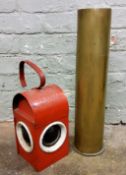 A Kenyon's Kenlite road lamp, red painted;  a large shell case (2)