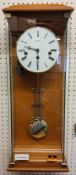 A contemporary Hermle Regulator Wall Clock, Beech finish, 8 Day Movement 4/4 Westminister chime,