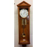 A Hermle & Sohn yew wall clock, regulator, 4/4 Westminster chime (time side cable driven, chime