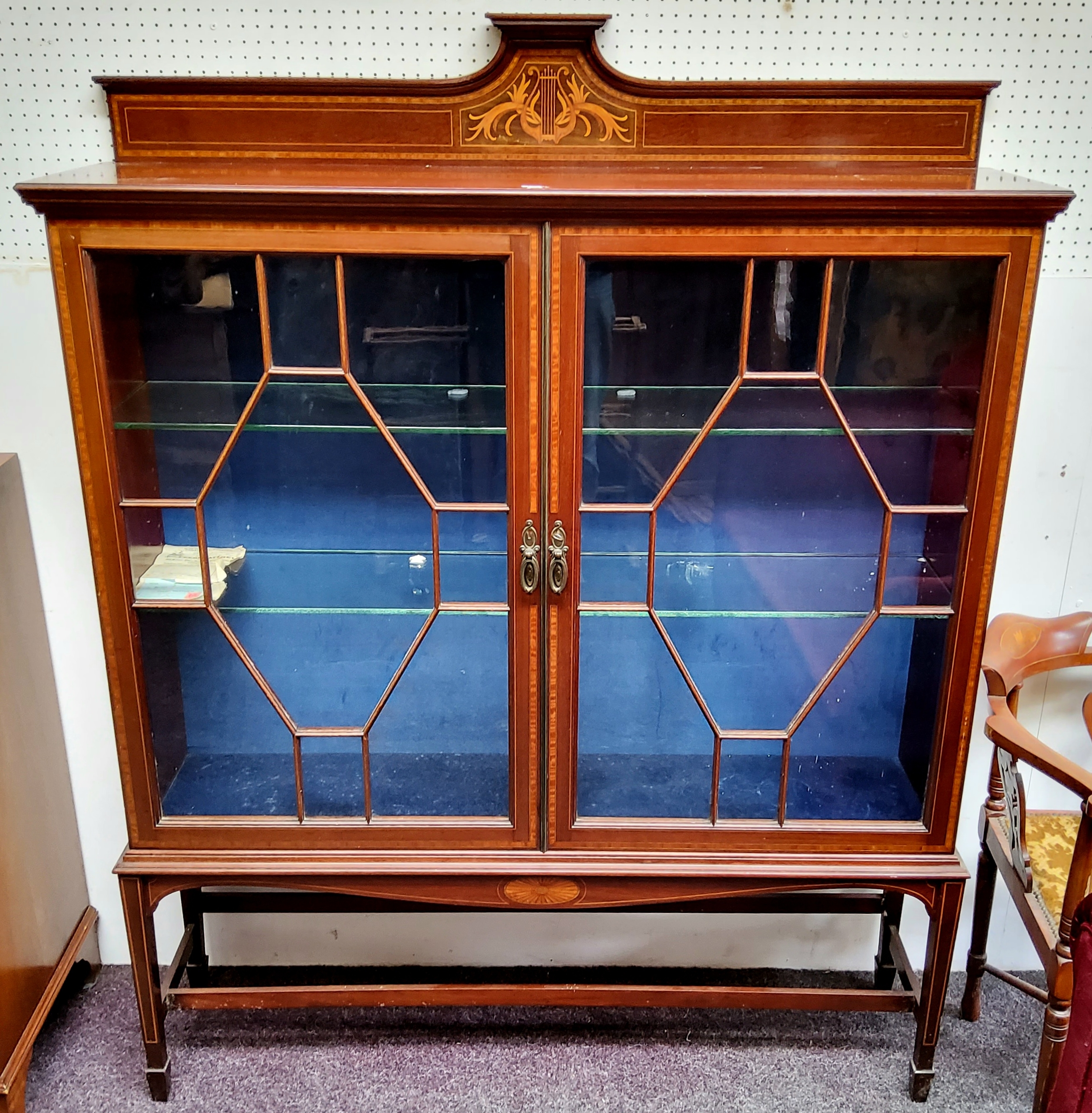 An Edwardian Sheraton Revival mahogany and satinwood inlaid display cabinet, the super structure