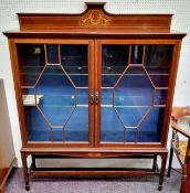 An Edwardian Sheraton Revival mahogany and satinwood inlaid display cabinet, the super structure