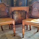 A pair of Victorian Welsh mahogany chapel chairs; a small Victorian hall table (3)