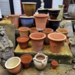 Large quantity of plant pots, terracotta, concrete, figures, etc