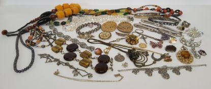 Costume jewellery including a gilt metal seed pearl brooch, other brooches, marcasite necklace, a