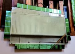 An Art Deco shaped rectangular mirror, emerald green glass panelled border,  76cm wide,  48cm high