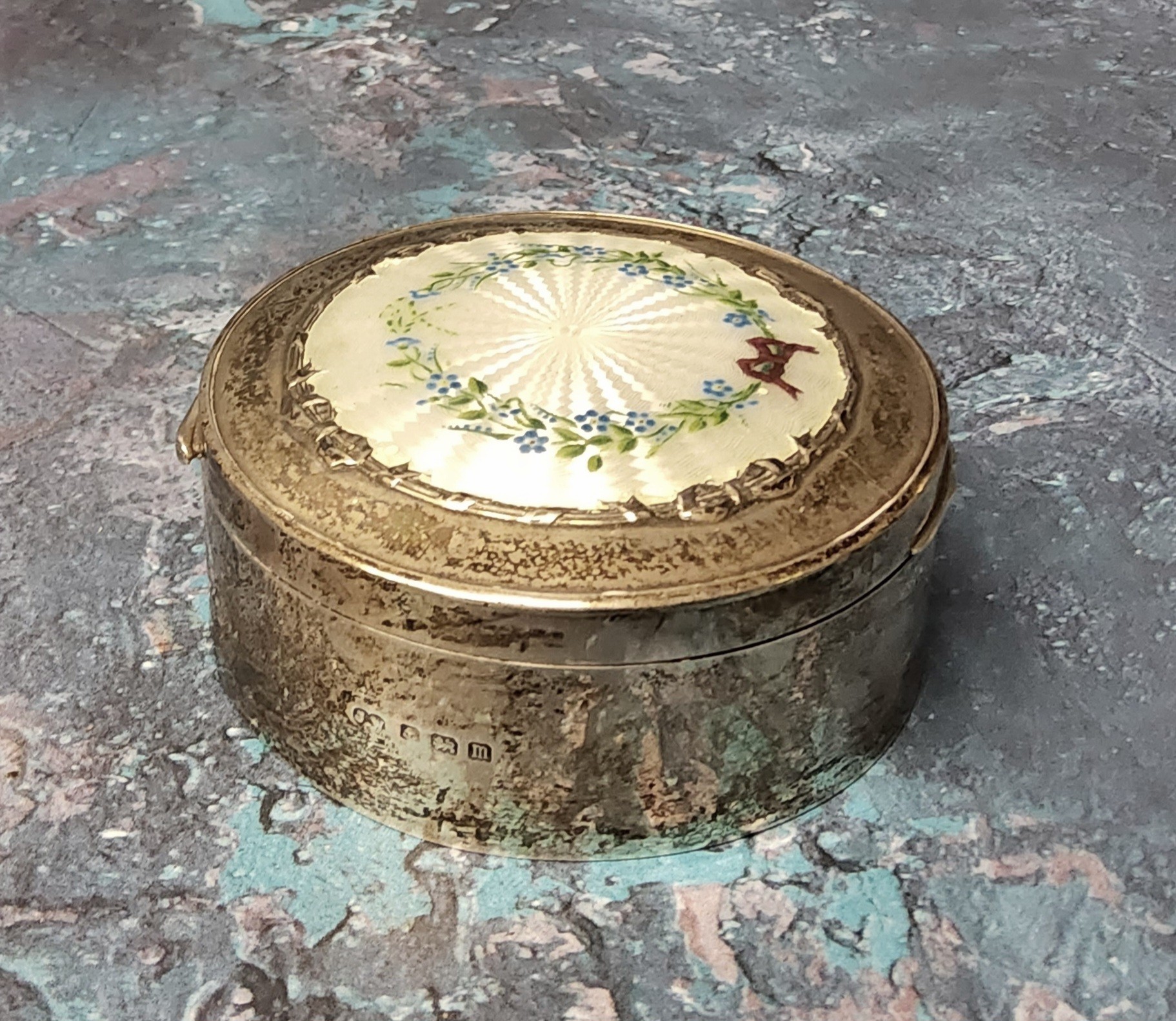 A silver circular jewellery trinket box, the hinged cover decorated with a central white guilloche - Image 2 of 2