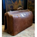 An early 20th century leather Gladstone bag