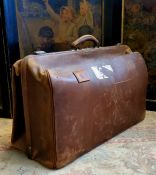 An early 20th century leather Gladstone bag