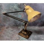 A Herbert Terry Anglepoise lamp - an early example finished in cream and black, weighted plinth