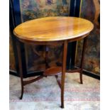 An Edwardian Sheraton Revival oval occasional table, satinwood and ebony barber pole stringing,