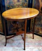 An Edwardian Sheraton Revival oval occasional table, satinwood and ebony barber pole stringing,