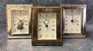 Two silver mounted miniature alarm clocks in form of mantel clocks, silver panels to front, wood