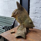 A decorative terracotta fountain finial in the form of a fish (for restoration)