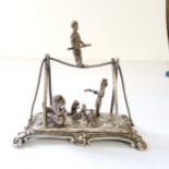 A good Dutch silver miniature diorama of a circus & ringmaster including trapeze artist, a