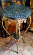 A fine Louis XVI style Gueridon, circular verde marble top, gilt metal mounts and scroll legs,