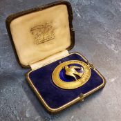 A silver gilt and blue enamel Derbyshire Provincial Grand Deacon Masonic collar jewel/medallion,