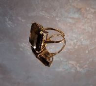 A large smokey quartz ring, emerald cut, 9ct gold mount