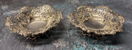 A pair of Victorian pierced bon-bon/sweetmeat dishes,  pierced pedestal, 10.5cms dia., 4cms high,