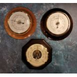 A satinwood mounted Aneroid barometer, Russell Scientific Instruments, 15cms dia etc. NOS all in