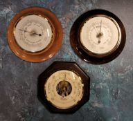 A satinwood mounted Aneroid barometer, Russell Scientific Instruments, 15cms dia etc. NOS all in