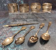 A silver napkin ring, Chester 1921;  others;  silver golfing tea spoons;  etc, 137g, 4.4toz