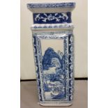 A modern Chinese blue and white panelled square vase, each side decorated with a monumental