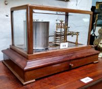 A Cassella of London barograph, marked 891 twelve diaphragm bellows, cased in bevelled glass,