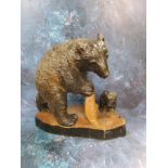 A late 19th century Black Forest model, of a bear and cub, 33cm high, c.1890-1900