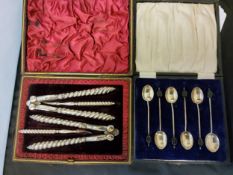 A set of six silver coffee spoons, coffee bean terminals, Birmingham 1927, cased;  a pair of