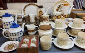 A set of six Hornsea Fleur pattern coffee cups and saucers;  a similar storage jar;  Midwinter