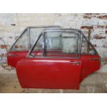 Three vintage red  model doors, nearside front and rear doors and offside rear door. Approx 95cm