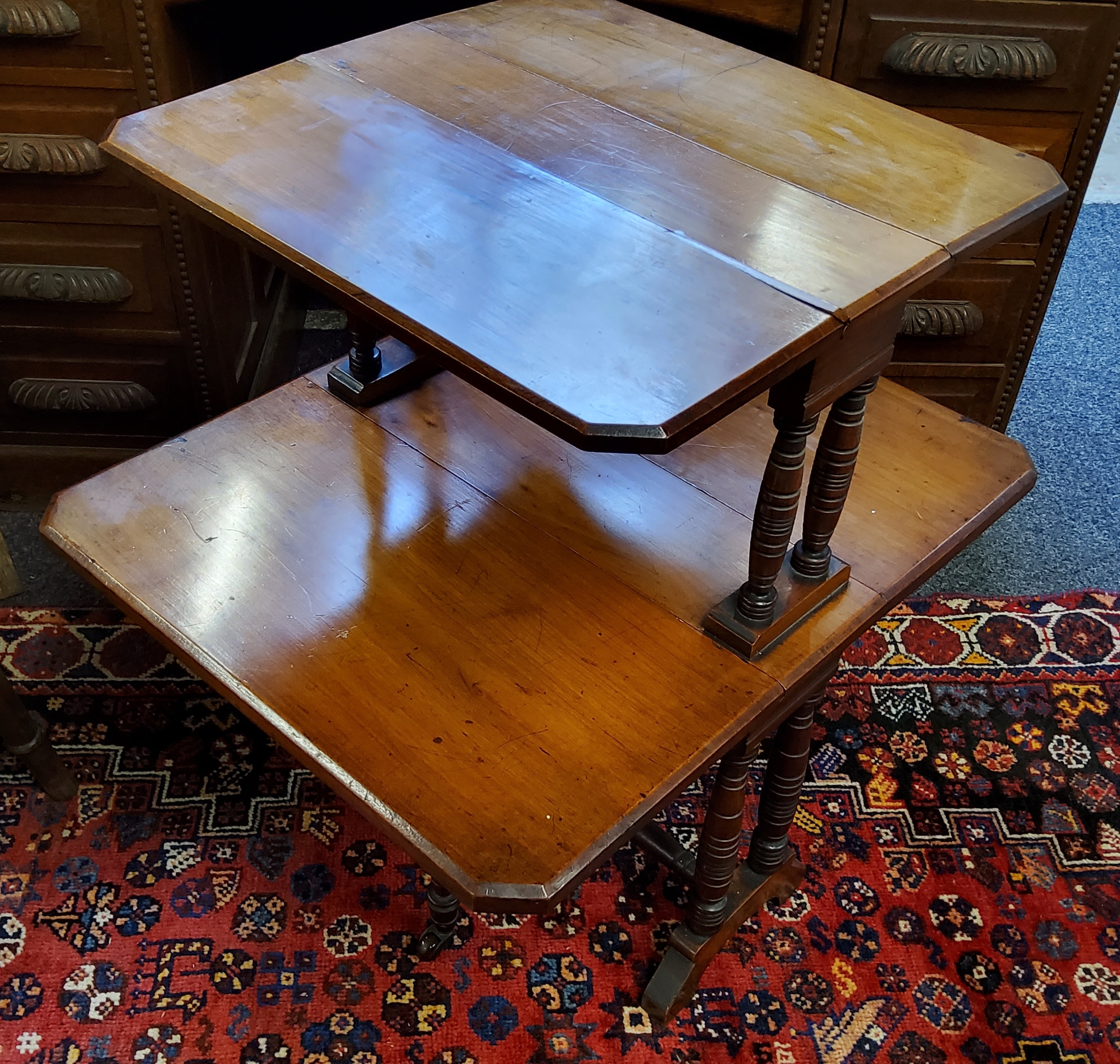 A Victorian walnut two-tier Sutherland gateleg occasional table, each with canted corners on - Image 3 of 3