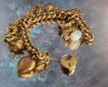 A Victorian 9ct rose gold hollow curb charm bracelet, embossed in relief decoration, 15 charms