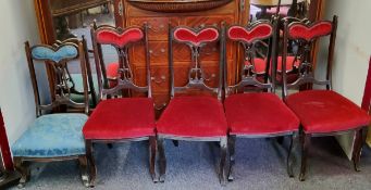 A set of four Art Nouveau ebonised salon chairs, c.1915;  a similar nursing chair (5)
