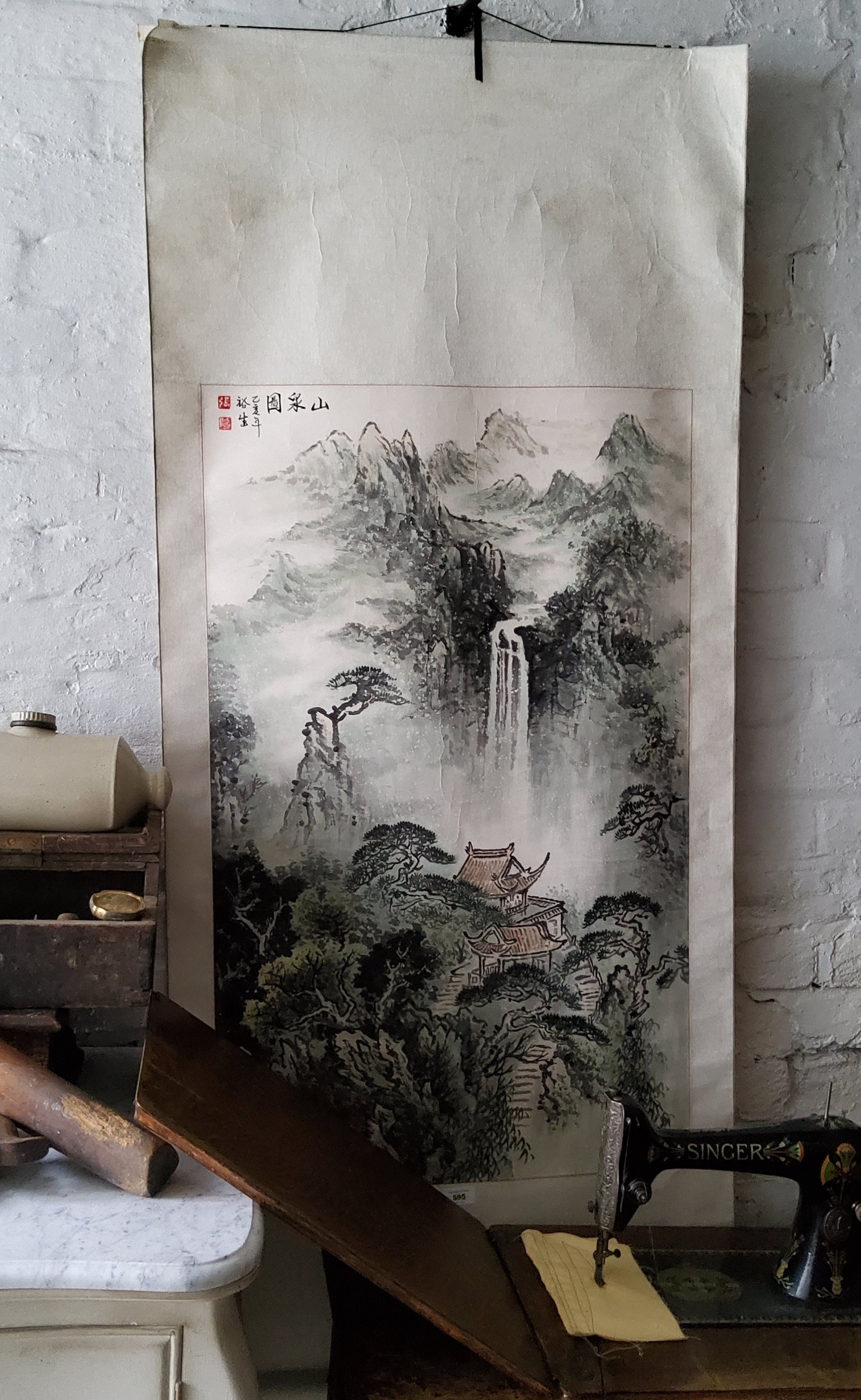 A Chinese calligraphy scroll in the manner of HUANG JUNBI, ink washed mountain side dwelling beneath