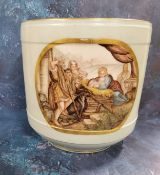 A late 19th century jardiniere, painted with a nativity scene, within a gilt oval cartouche on a