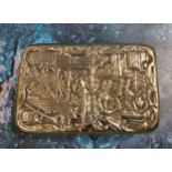 An early 19th century rounded rectangular snuff box, the cover embossed with a tavern scene, 7.5cm