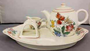 A Grays Pottery breakfast set, possibly designed by Susie Cooper, comprising a teapot, milk jug, and