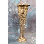 A Victorian silver trumpet shaped vase, embossed with scrolling foliage, everted rim, 16cm high,