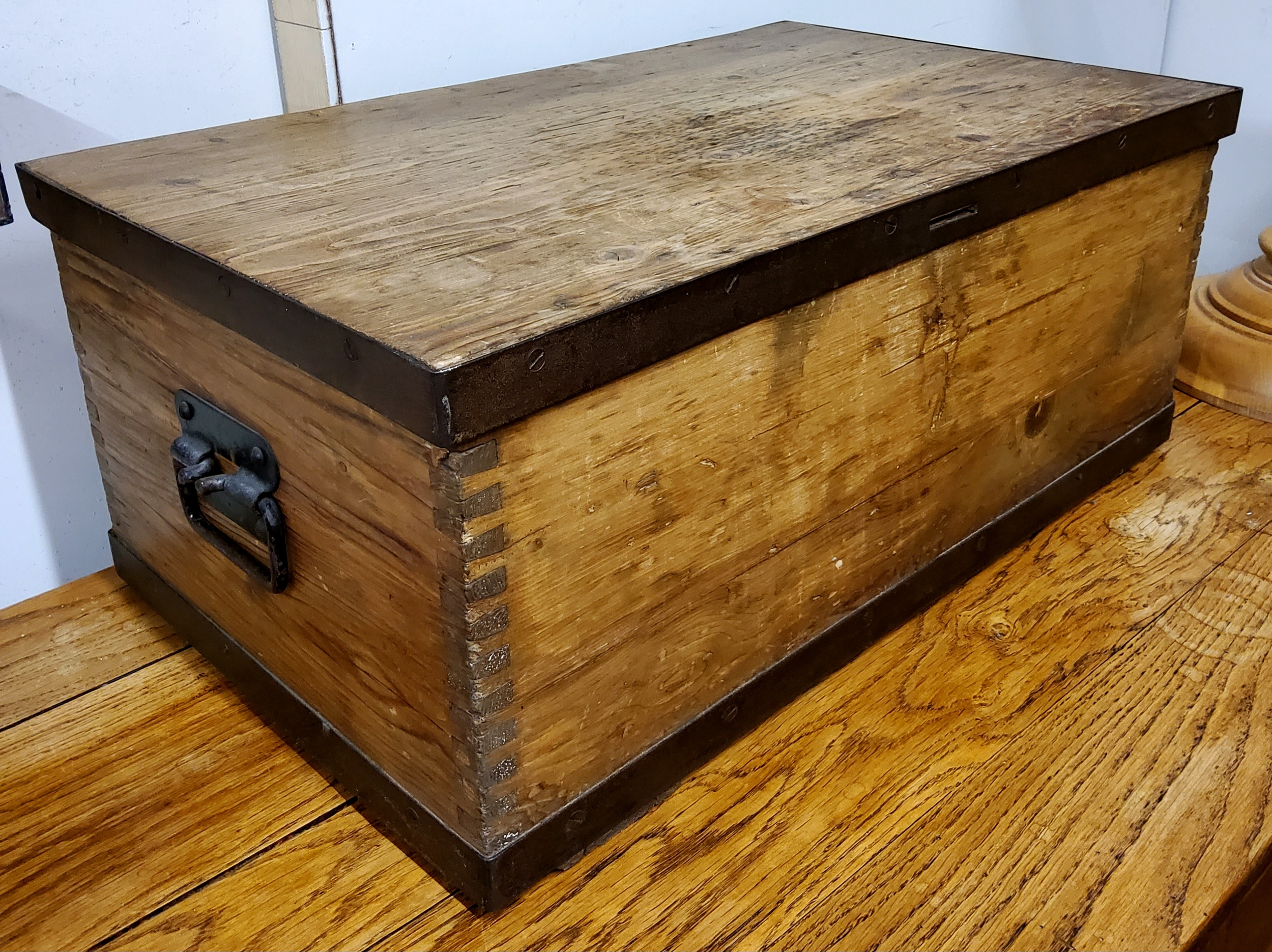 A metal bound farmhouse pine box, drop swing carrying handles, 67cm wide x 41cm deep x 28cm high - Image 2 of 2
