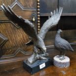 A bronzed resin, Eagle, with wings outstretched,  rectangular base, 34cm high;  another,
