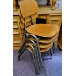 A set of four mud century stacking chairs