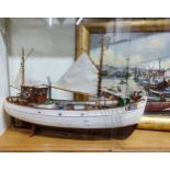 A scratch built fishing boat on stand
