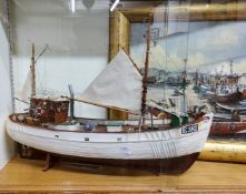 A scratch built fishing boat on stand