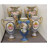 A pair of Noritake two handled ovoid vases, decorated with stylised flowers and scrolls, 21cm