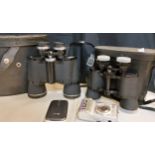 A Halina binoculars 12 x 50, cased;  Omiya binoculars, 8 x 40;  a Doro 6520 folding mobile phone,